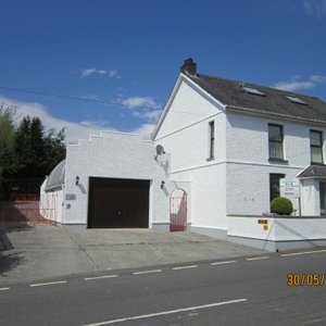 Front of house and entrance to car park