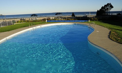 heated pool with the beach view