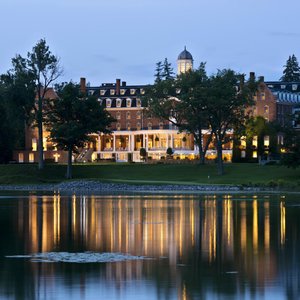 The Otesaga Resort Hotel in Cooperstown, image may contain: Scenery, Outdoors, Nature, Chair