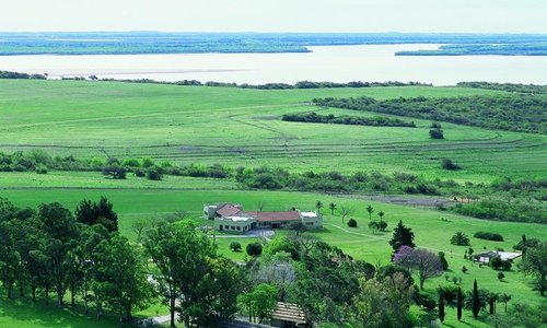 Aerial view of the lodge and the river in the background