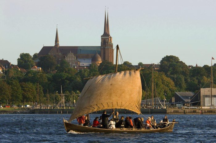 The Viking Ship Museum is located on the shore of the fjord in the old Danish town of Roskilde.