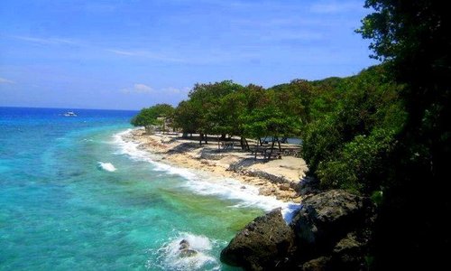 view of the beach from the pool area