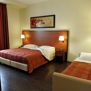 Hotel Gullo in Acconia, image may contain: Bed, Furniture, Bedroom, Chair