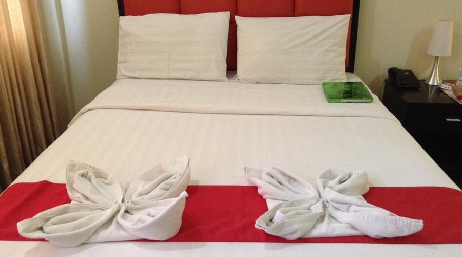 nicely made up bed presentation