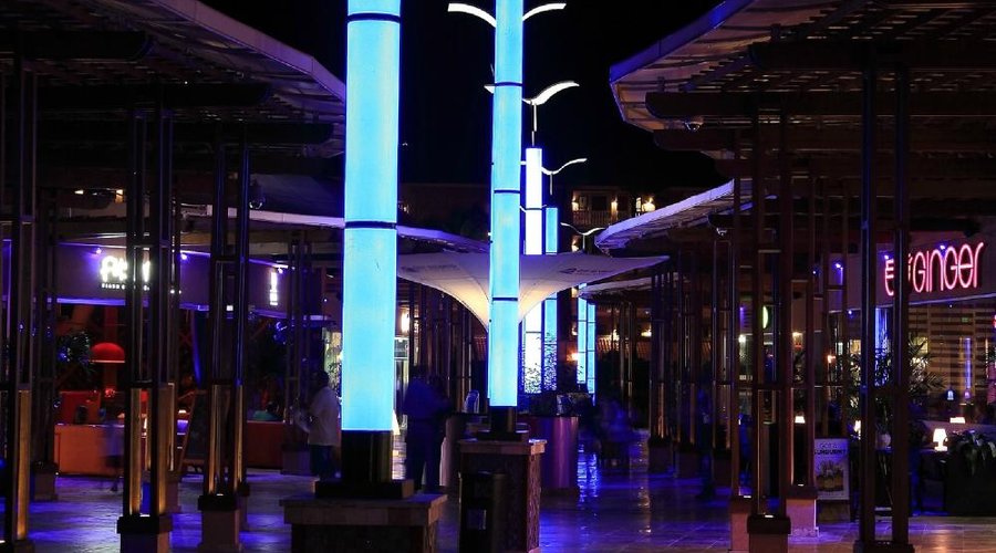 The shops at night.
