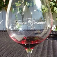 Enjoying a glass of pinot noir at Four Graces