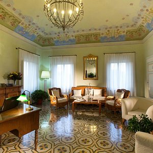 Palazzo Di Valli in Siena, image may contain: Living Room, Reception Room, Couch, Home Decor