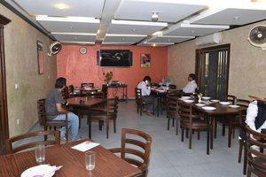 Hotel Sehwan Divine in Sehwan, image may contain: Restaurant, Indoors, Cafeteria, Cafe