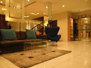 Hotel Guillermo in Mindanao, image may contain: Living Room, Home Decor, Coffee Table, Couch