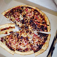 Over cooked thin base BBQ cheese & streaky bacon