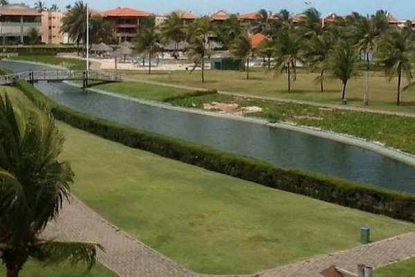 Visão do apartamento para a área de lazer do resort
