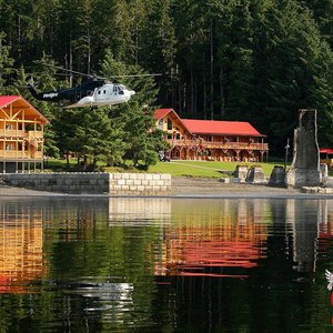 Totem House and the Main Lodge on the shore of Naden Harbour.
