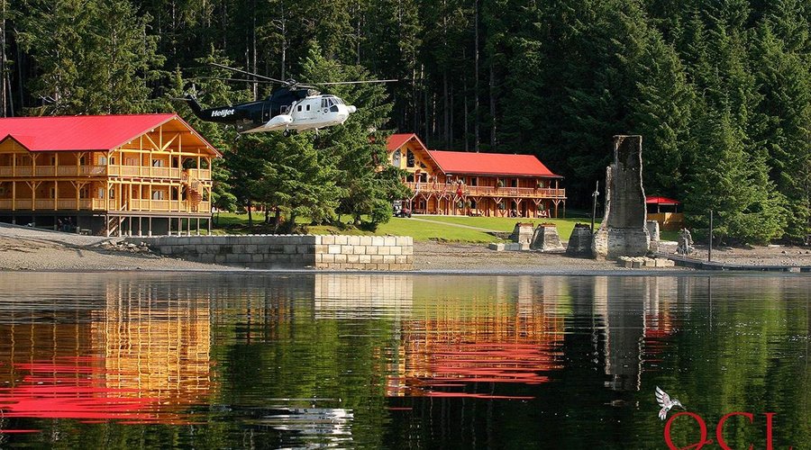 Totem House and the Main Lodge on the shore of Naden Harbour.