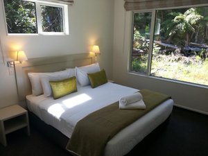 Aspen Court Franz Josef in Franz Josef, image may contain: Bed, Furniture, Lamp, Home Decor