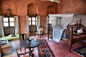 Zanzibar Coffee House in Zanzibar Island, image may contain: Furniture, Bedroom, Indoors, Bed