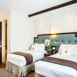 The Condor Hotel in Brooklyn, image may contain: Bedroom, Furniture, Bed, Indoors