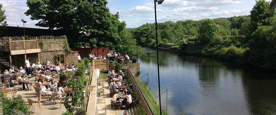 our stunning riverside beer garden which comes complete with an outside bar