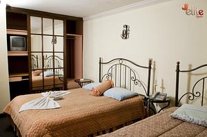 Hotel Villa Real San Felipe in Oruro, image may contain: Furniture, Bed, Monitor, Screen