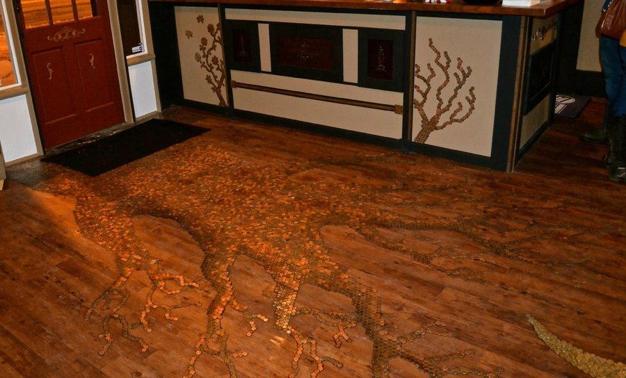 The penny tree greets guests as they enter the main room.