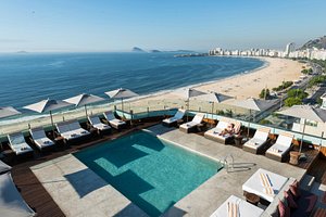 PortoBay Rio de Janeiro Hotel in Rio de Janeiro, image may contain: Pool, Water, Swimming Pool, Chair