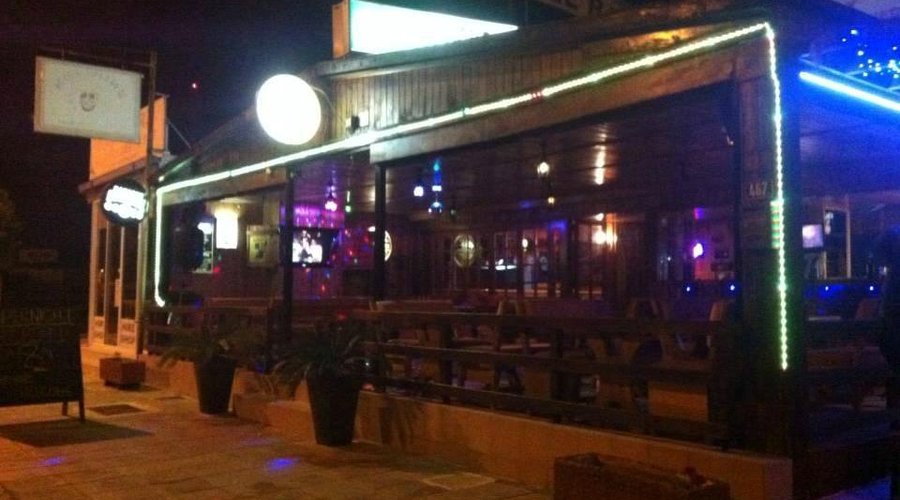 Front of the bar.