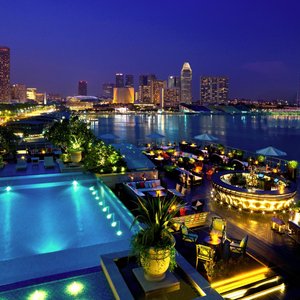 The Fullerton Bay Hotel Singapore in Singapore, image may contain: Chandelier, Table, Indoors, Dining Room