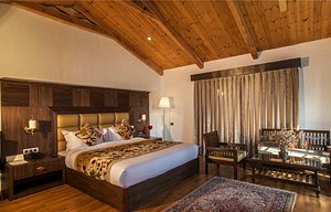 Lemon Tree Hotel, Srinagar in Srinagar, image may contain: Interior Design, Wood, Hardwood, Stained Wood