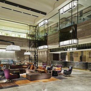 Royal Plaza Hotel in Hong Kong, image may contain: Interior Design, Home Decor, Bed, Chair