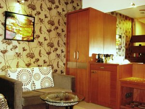 Data Inn in Ajmer, image may contain: Couch, Furniture, Living Room, Interior Design