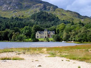 Glenfinnan House Hotel in Glenfinnan, image may contain: Scenery, Nature, Cottage, Building