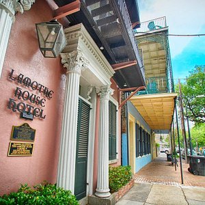Lamothe House Hotel in New Orleans, image may contain: Bed, Furniture, Cushion, Home Decor