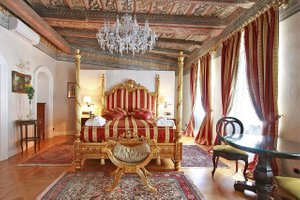 Alchymist Prague Castle Suites in Prague, image may contain: Furniture, Home Decor, Bedroom, Indoors