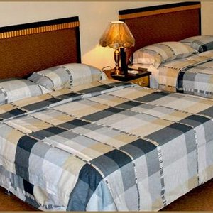 Room with two double beds