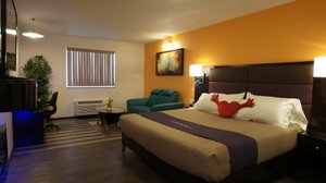 Dreamz Inn in Goderich, image may contain: Chair, Furniture, Home Decor, Bed
