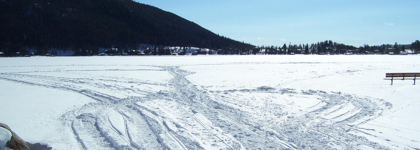 Snow mobile tracks at Grand Lake beach, February 2012