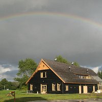 Strobalen huis van biologische boerderij De Groene Griffioen