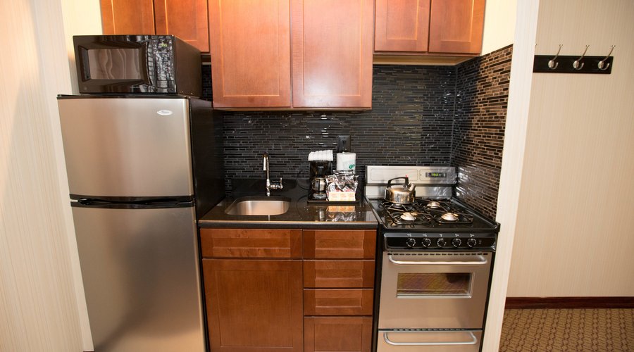 Two-Bedroom Apartment (with Queen Bed, Two Double Beds, Sofa Bed, and Kitchen) at Radio City...