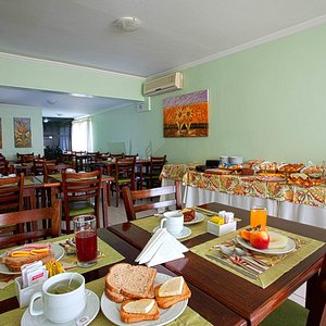 Café da manhã Carina Flat Hotel