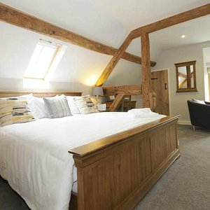 A luxurious, spacious suite with super-king size bed and stunning oak beams