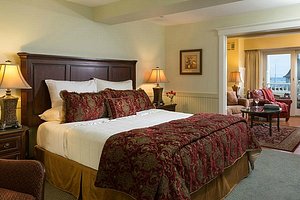 Grand Harbor Inn in Camden, image may contain: Table Lamp, Lamp, Home Decor, Bed