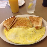 Ham and cheese omelette with Hashbrowns and toast