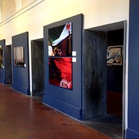 photo of images installed along exposition corridor