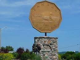Big Loonie with little loonies - Picture of Loon Dollar Monument, Echo Bay  - Tripadvisor