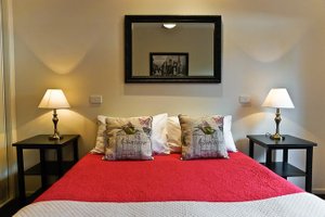 Adelphi Apartments in Echuca, image may contain: Cushion, Home Decor, Lamp, Table Lamp