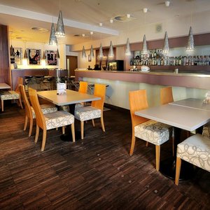 Hotel Biograf in Pisek, image may contain: Restaurant, Dining Room, Dining Table, Cafe