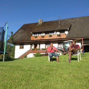 Enjoying a German beer in the sun shine. behind is the cottage