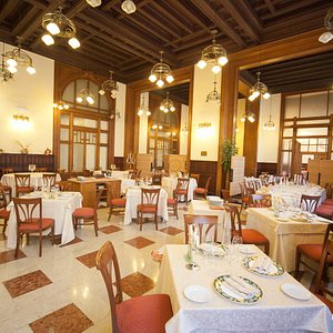 Grand Hotel Piazza Borsa in Sicily, image may contain: Restaurant, Dining Room, Dining Table, Cafeteria