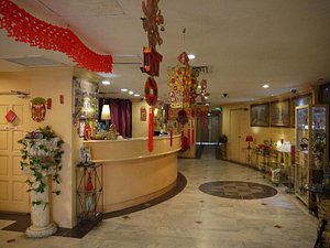Hotel Star Town Inn in Kuala Lumpur, image may contain: Floor, Flooring, Table, Reception