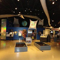 The museum curves around the planetarium in the center.