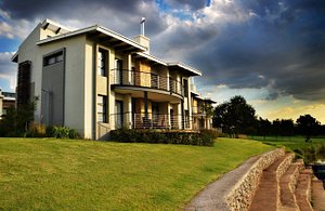 The Fairway Hotel, Spa & Golf Resort in Randburg, image may contain: Villa, Housing, Grass, Lawn